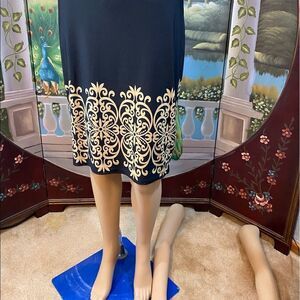 White Mark Black Skirt with Tan Scroll Border Size Large